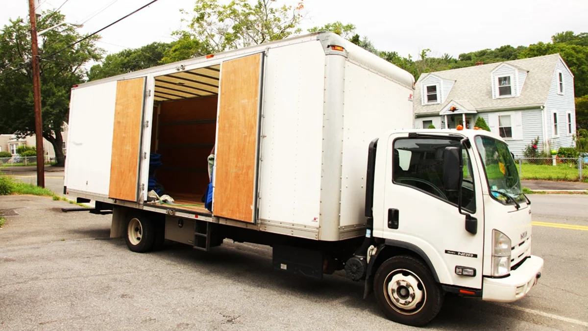 Happy family moving into their new home with OwnBridge relocation support